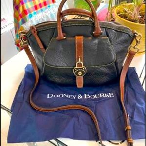 Dooney and Bourke black and brown purse, with handles and strap, red interior